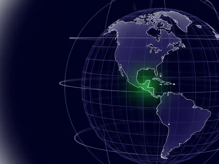 A dark globe of fine indigo lines with one vibrant green point of light over North America.